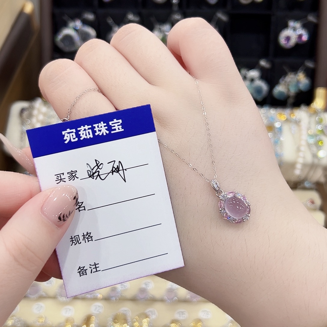 晓***丽银S925镶嵌蛇纹石玉戒指