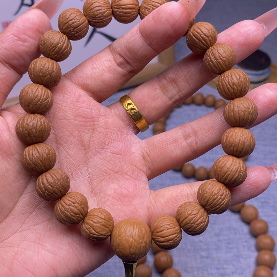 猴头核桃手串T****-凤羽