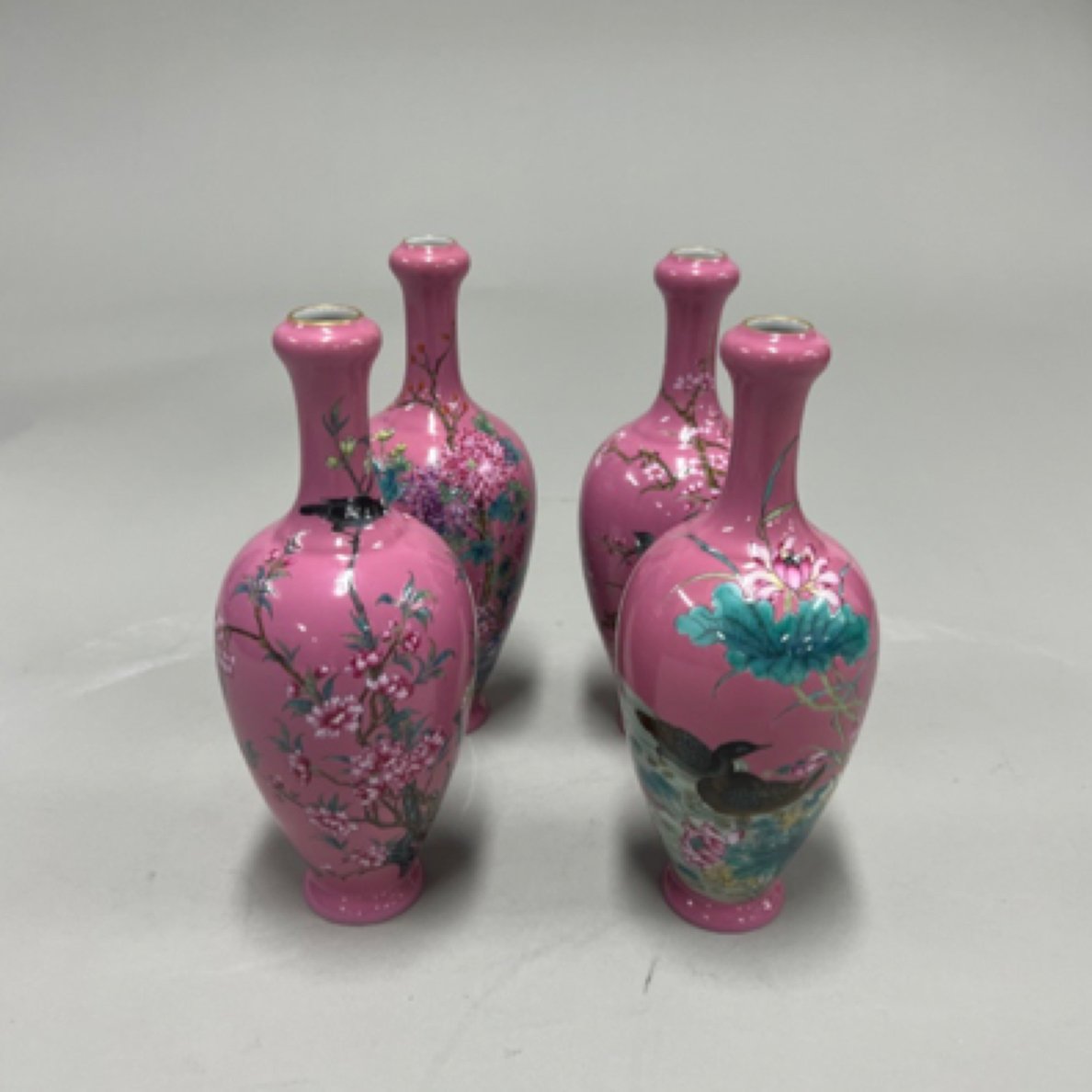 清 胭脂红釉地粉彩四季花卉纹小瓶一组