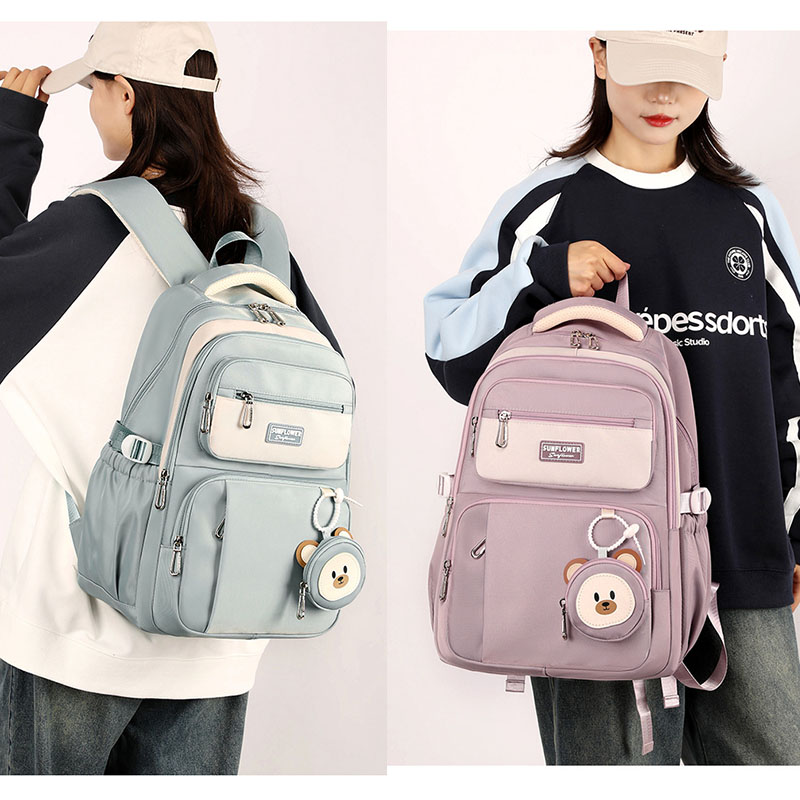 小学初高中书包休闲韩版校园双肩包五六年级轻便减负男女学生背包