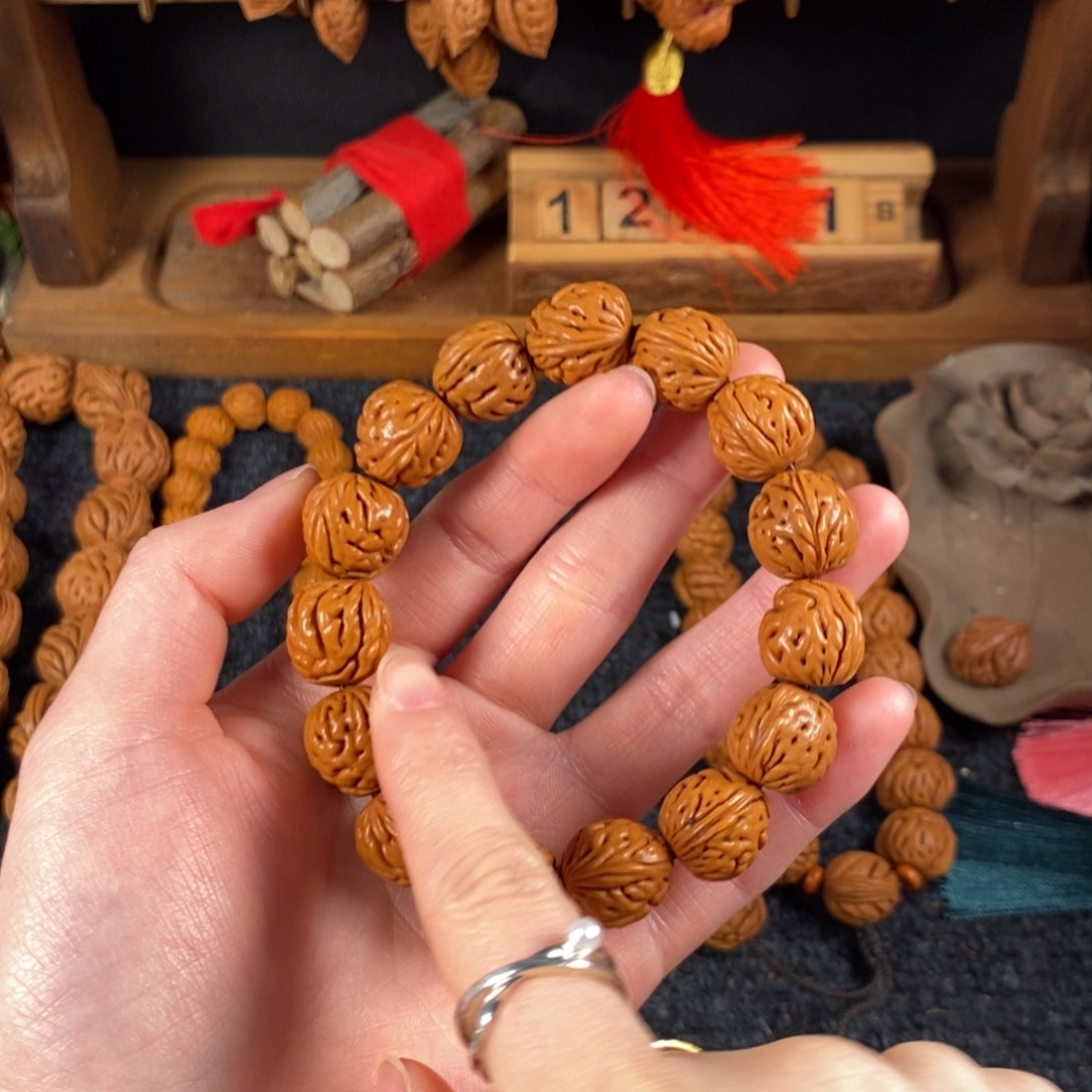 吊坠桃核桃枭手串