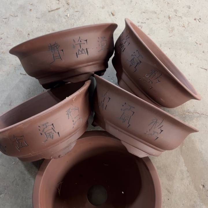 紫砂花盆100-5。      33-14