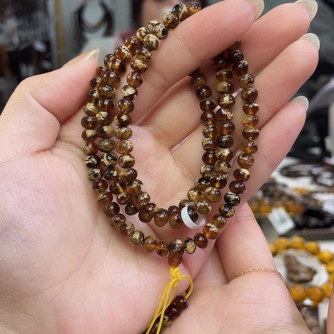 琥珀裸石未镶嵌6+溶洞妖花108