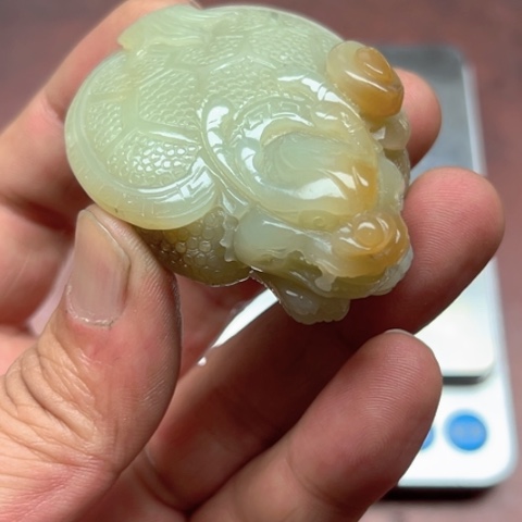 和田玉手把件未镶嵌