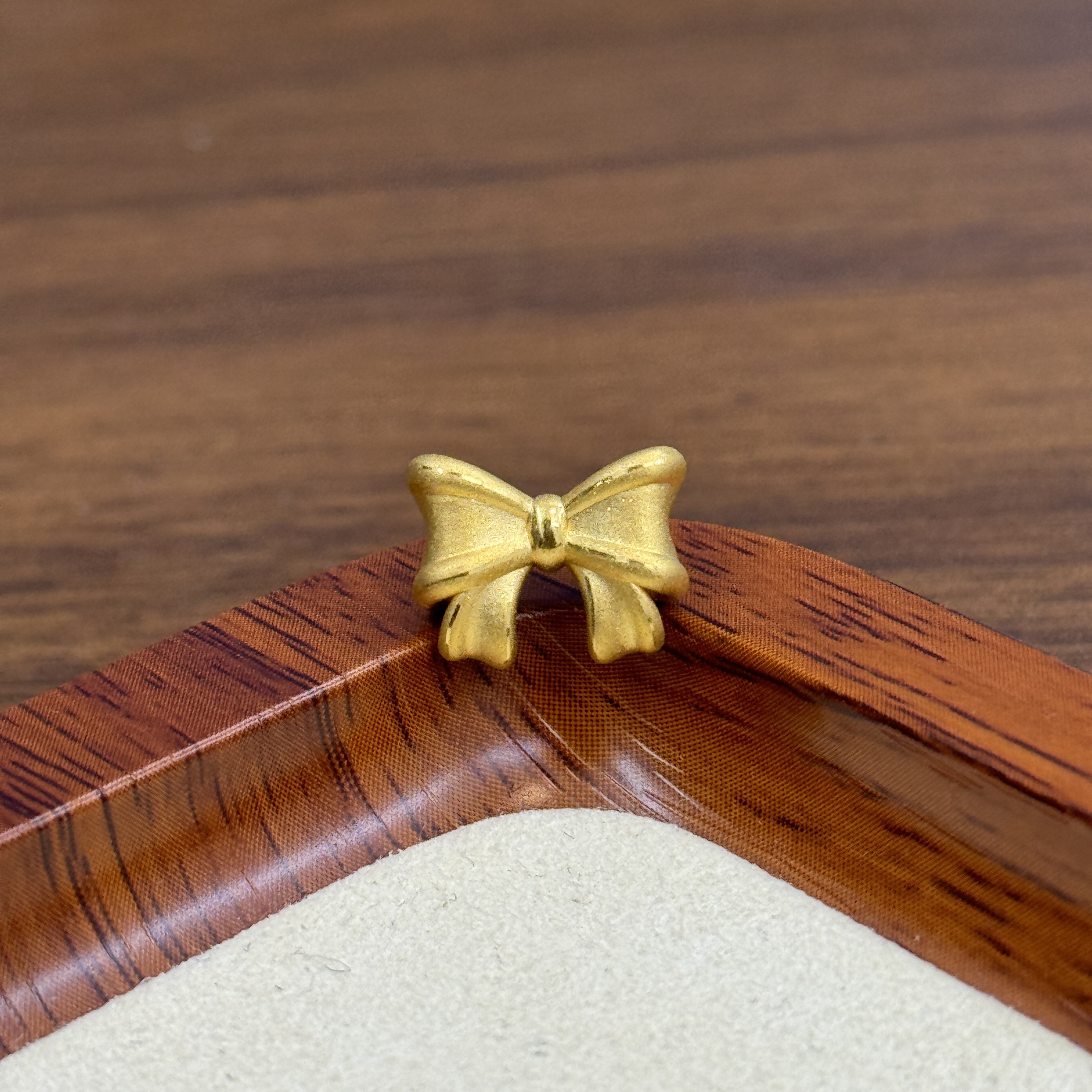 顺鑫黄金足金999加厚通孔蝴蝶结DP2135-0820