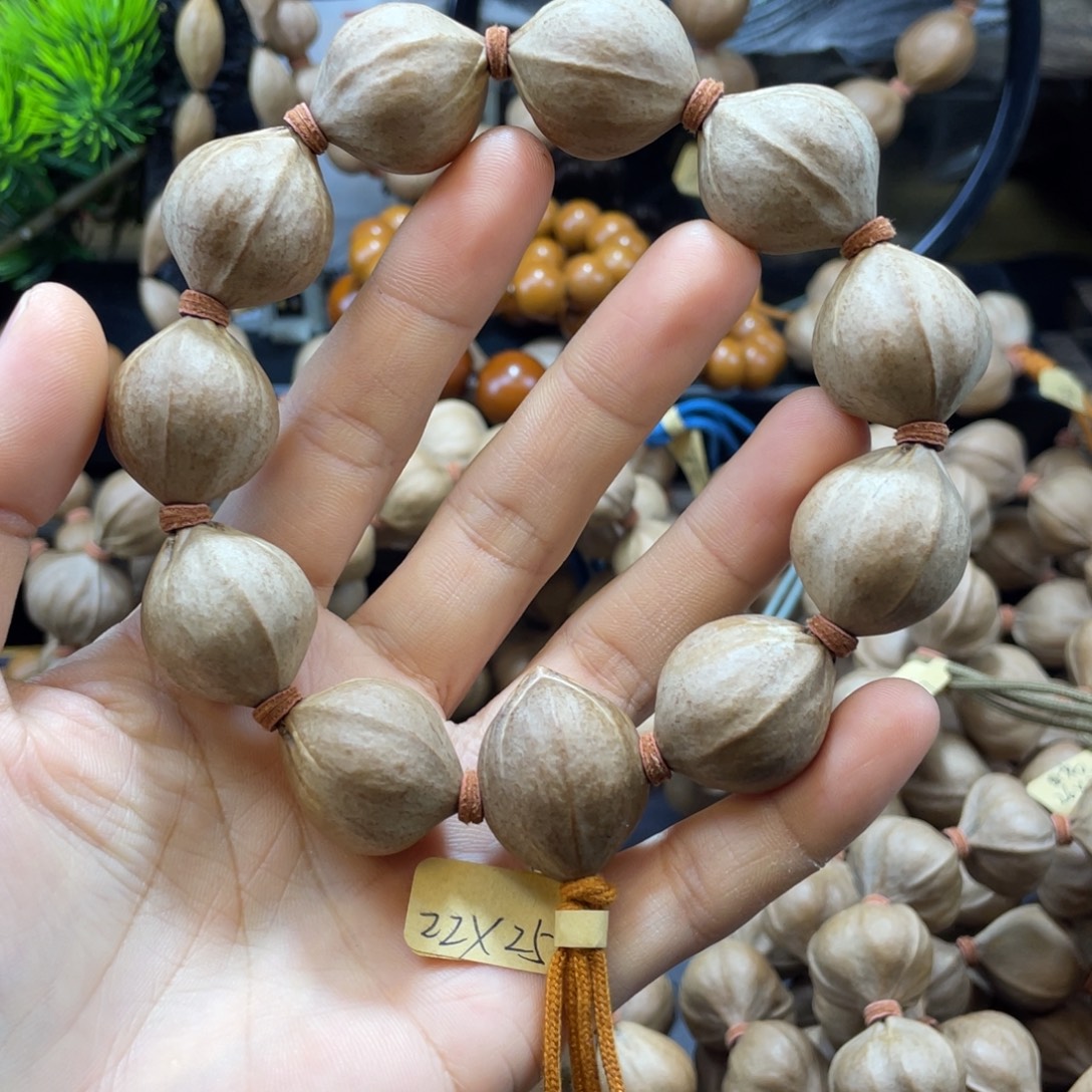 路***通橄榄核吊坠2225老料