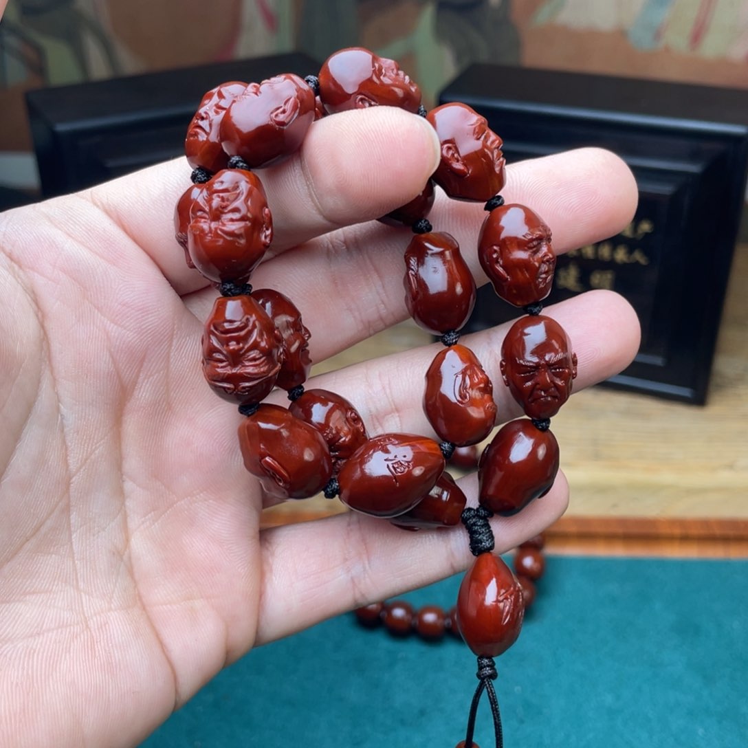 橄榄核手串鑫****厂十八罗汉表弟回血