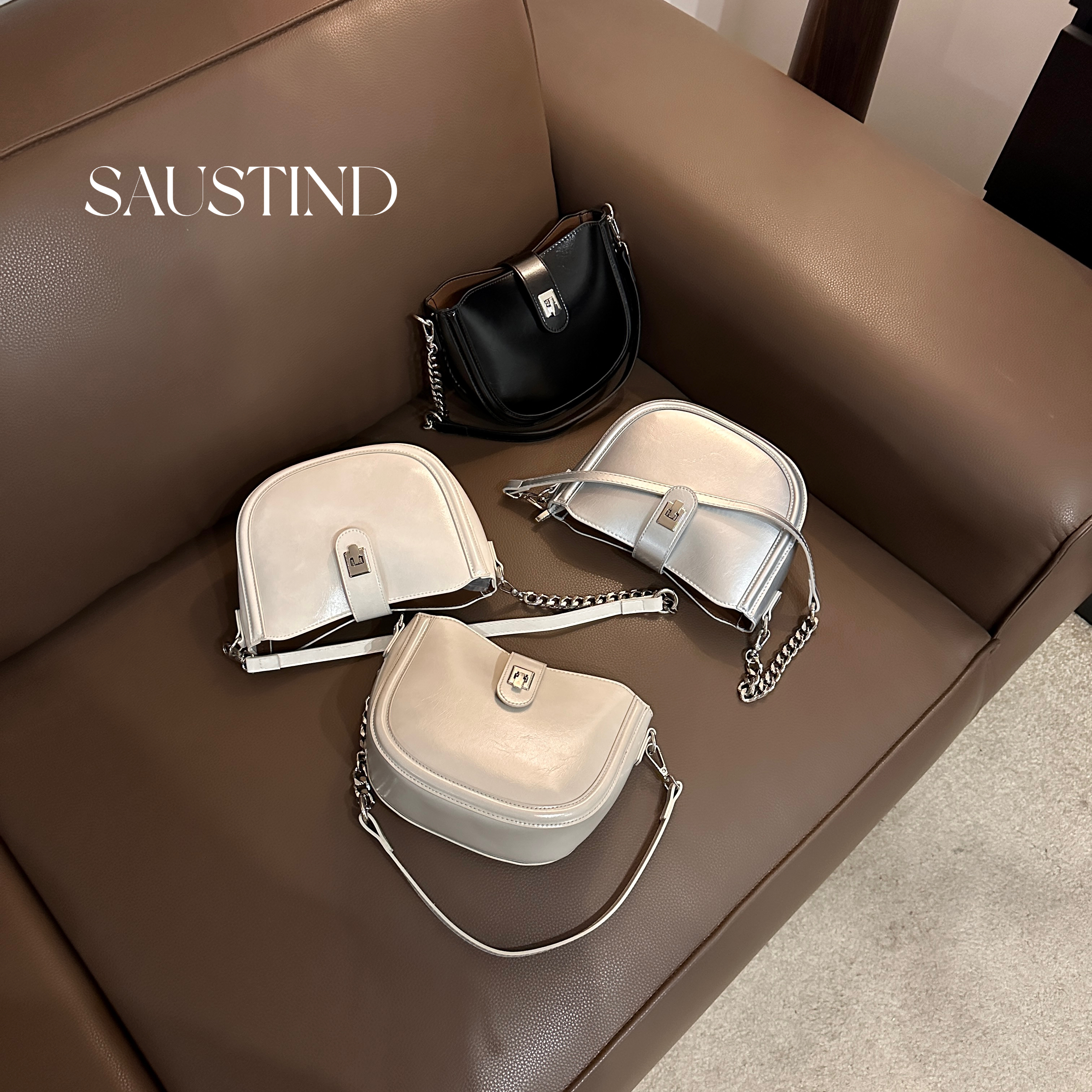 森斯汀2025年新款经典百搭单肩斜挎多隔层大容量马鞍包女包 68011