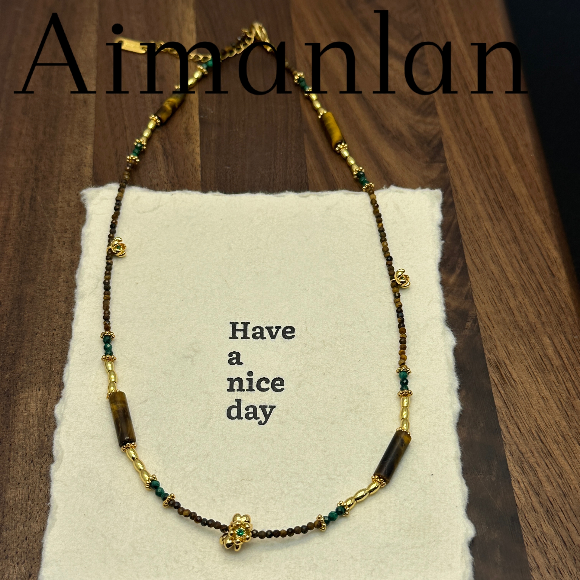 艾蔓岚原创设计虎眼石花朵跑环项链轻奢气质小众叠戴毛衣链A6303