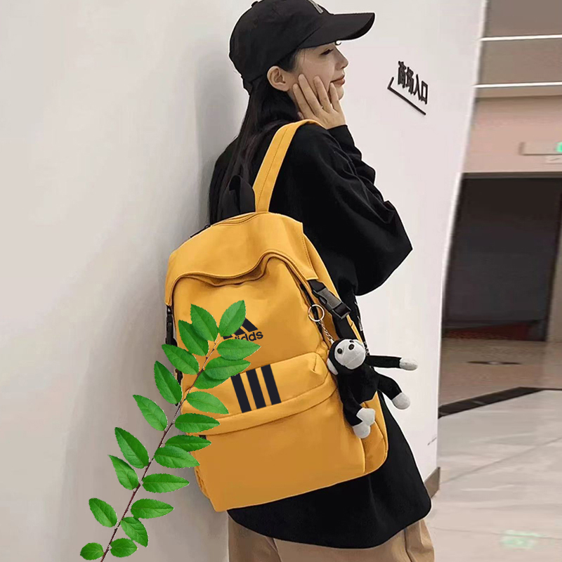 2025年情侣男女双肩包款户外休闲运动书包背包黄色