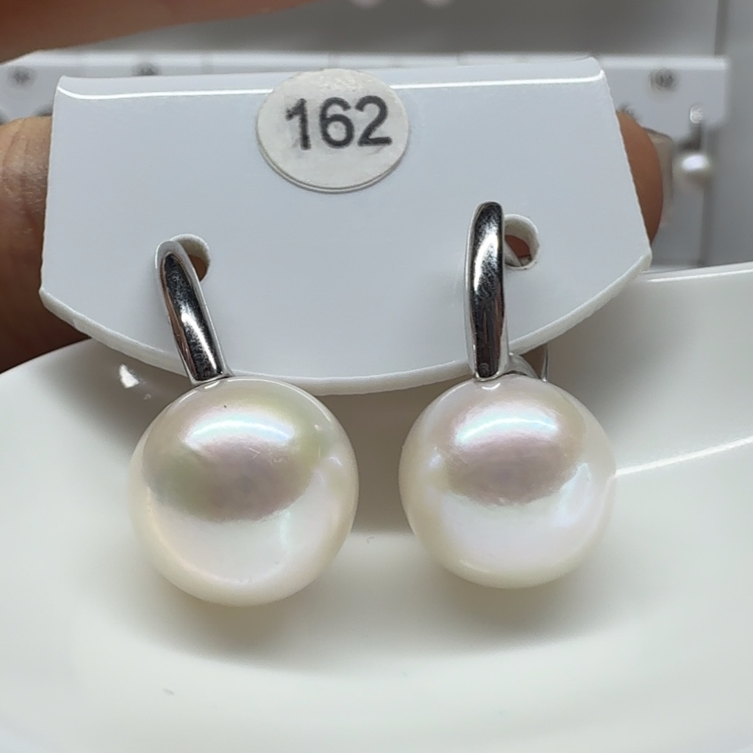 曦***曦淡水珍珠银S925镶嵌耳饰珍珠