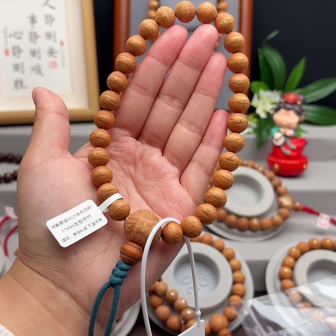 向***风凤眼菩提手串11左右素手持