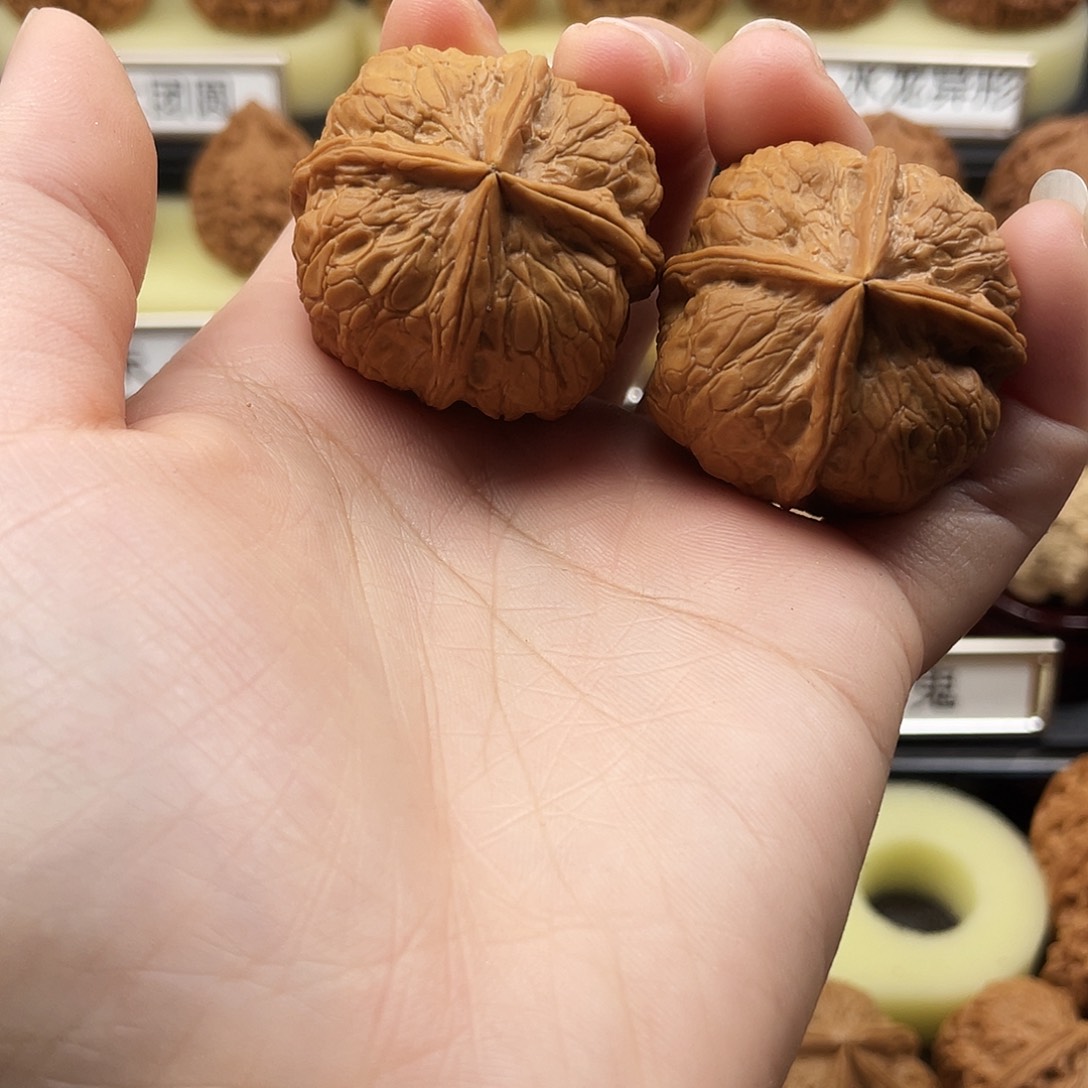 文玩核桃把件何**下四棱752