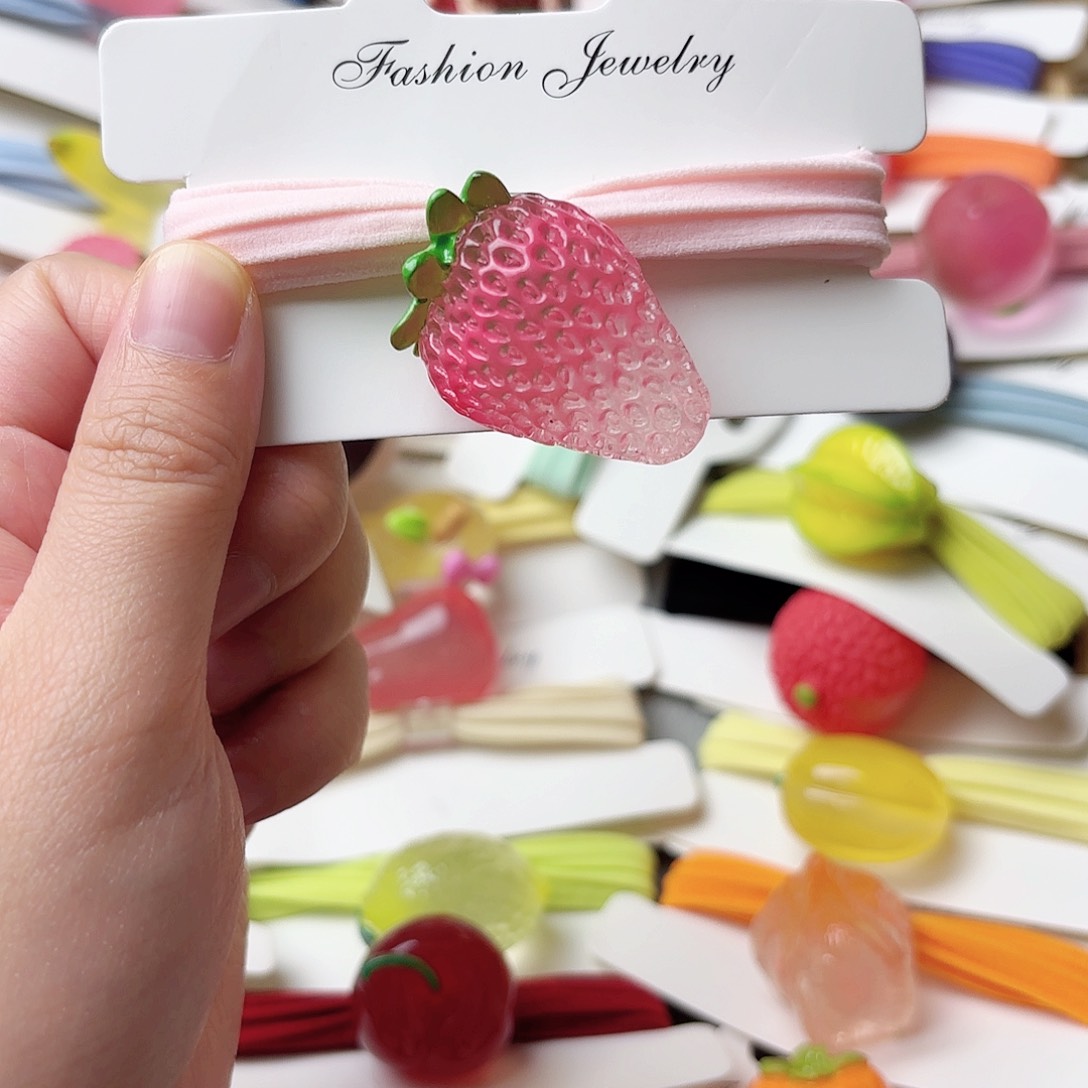 布艺非金属夜光粉草莓发绳