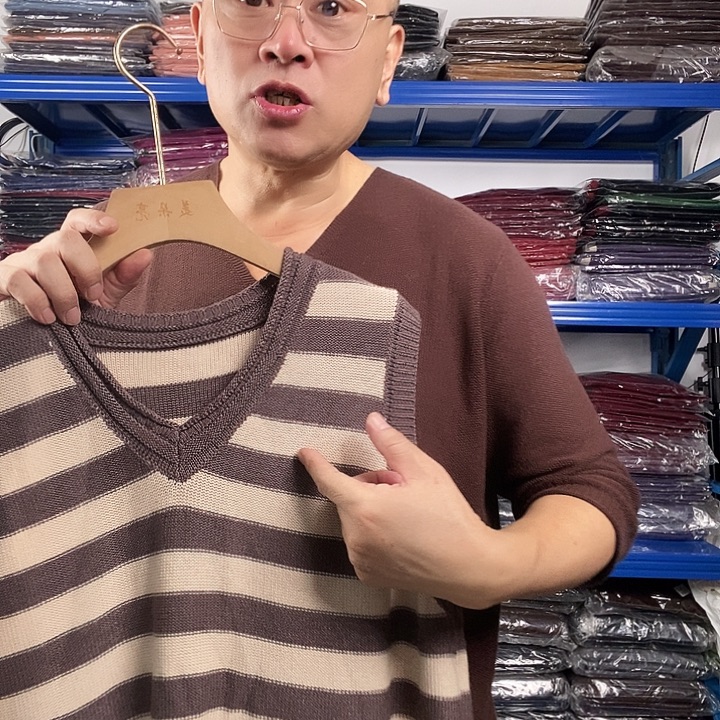 张***元条纹马甲驼色哈哈哈