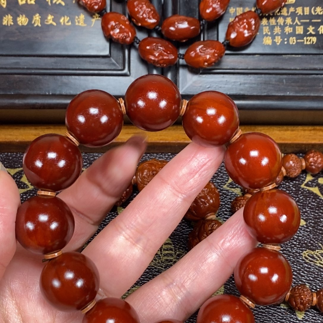 宜***宴橄榄核吊坠光珠111111