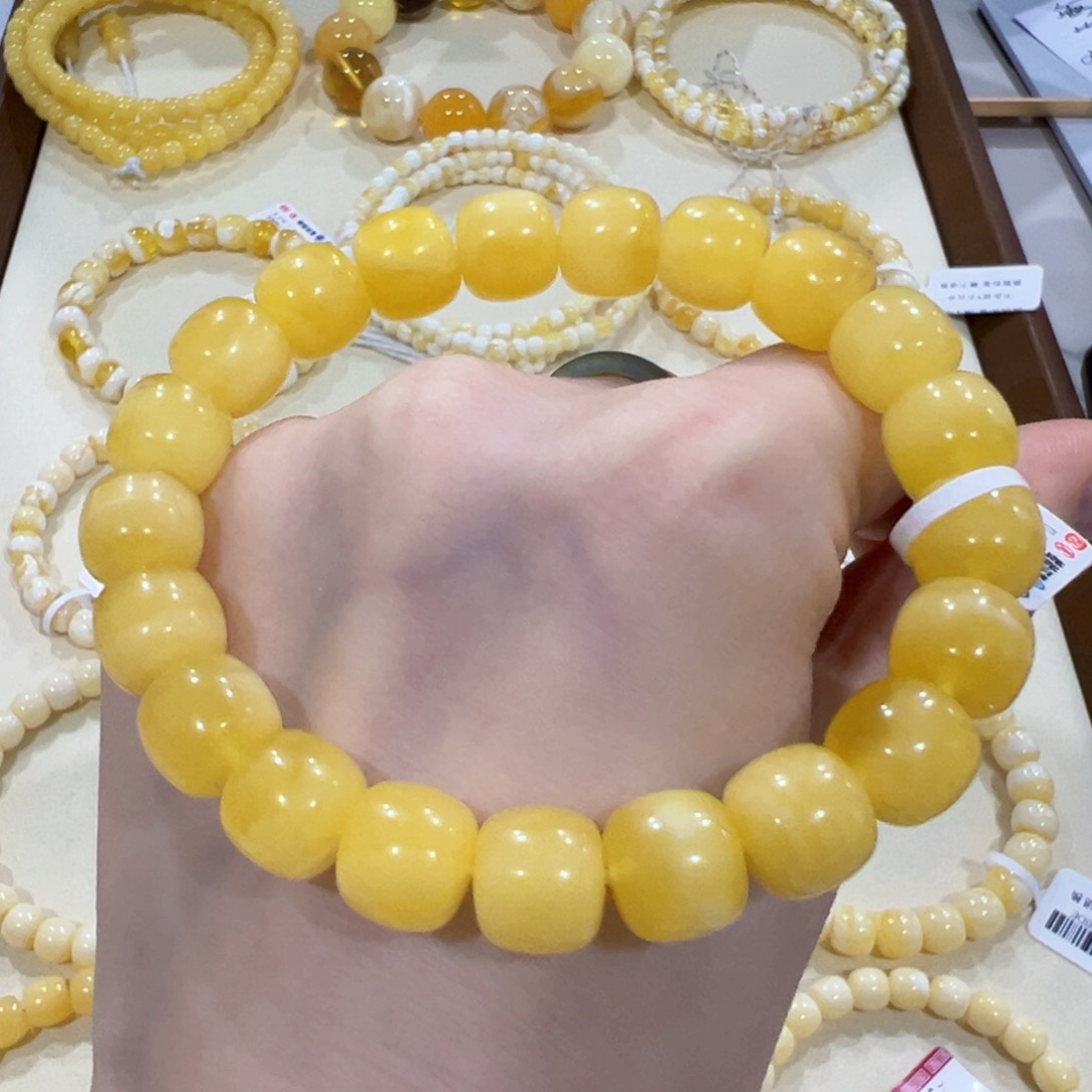 蜜蜡手链未镶嵌10.6m鸡油黄 瑕