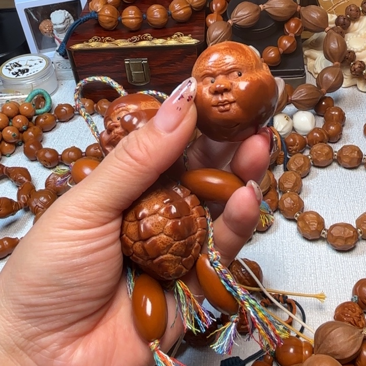 拉***王手串/手链橄榄核富贵头