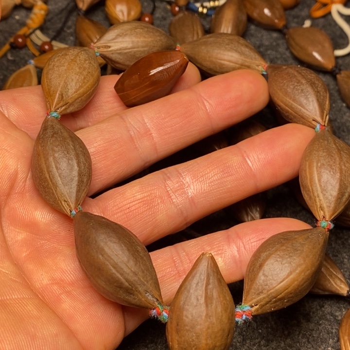 手串橄榄核1.6紫肉39号