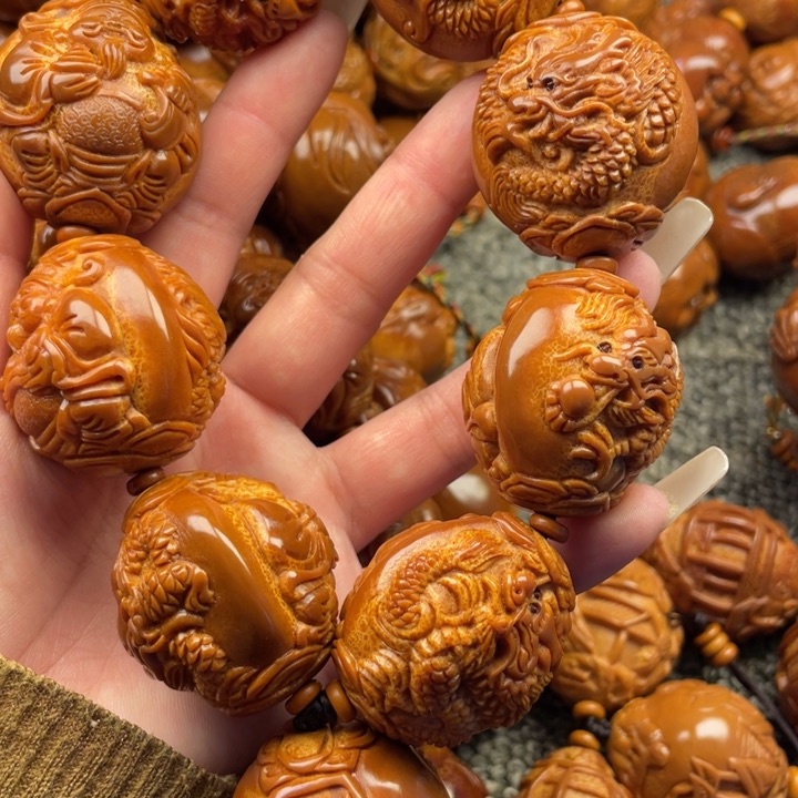 橄榄核吊坠嗷****哥橄榄核