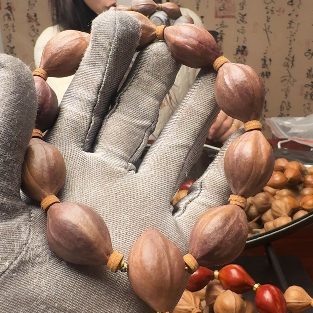 橄榄核把件紫皮核