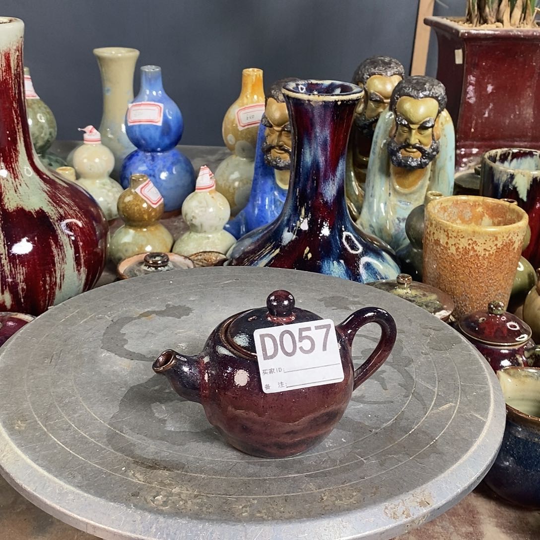 9***5彩名窑紫砂057。    