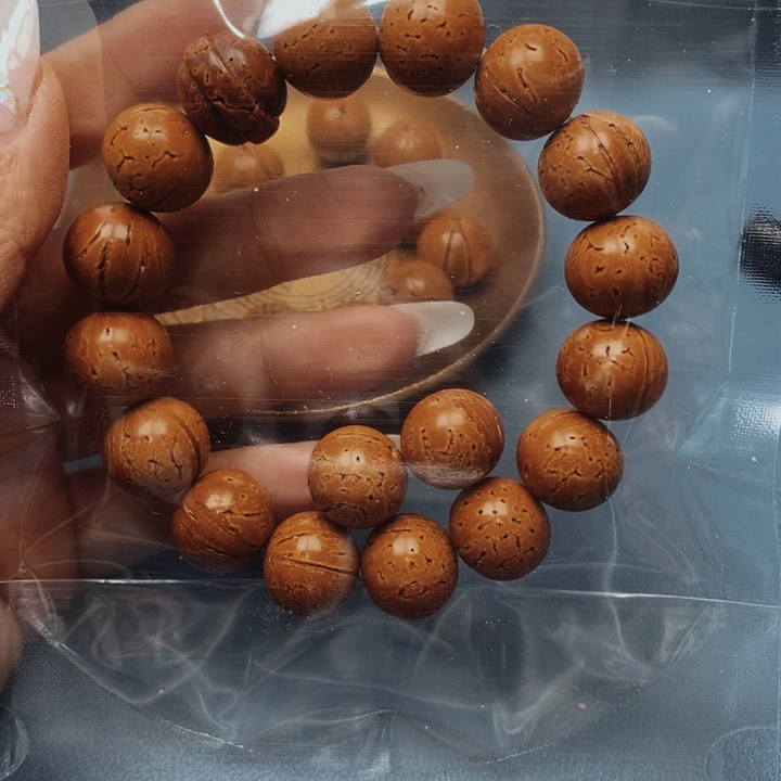 桃核手串极限圆16花皮色差15颗