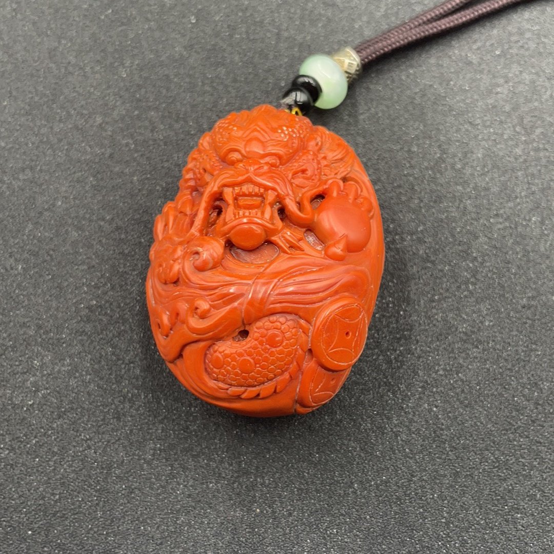 BY0108FZJT253 南红龙行天下手把件