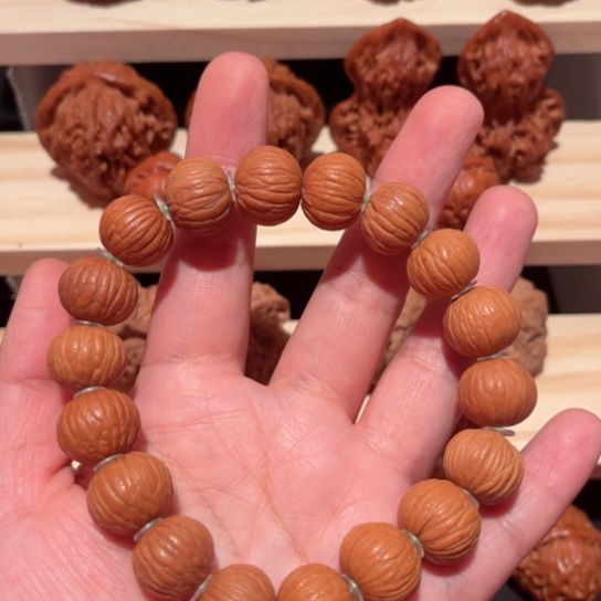 文玩核桃吊坠猴头手串