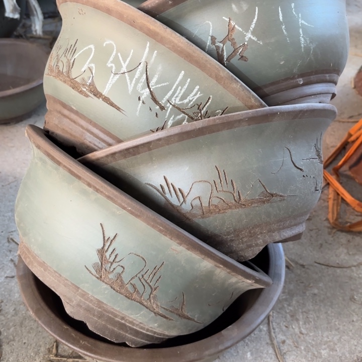 紫砂花盆100-5。       33-14