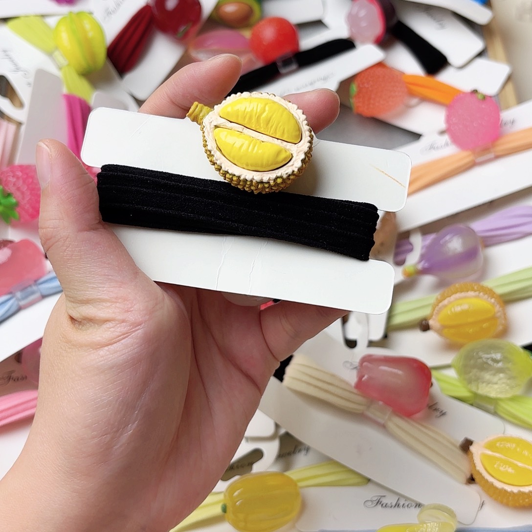 布艺非金属夜光榴莲发绳