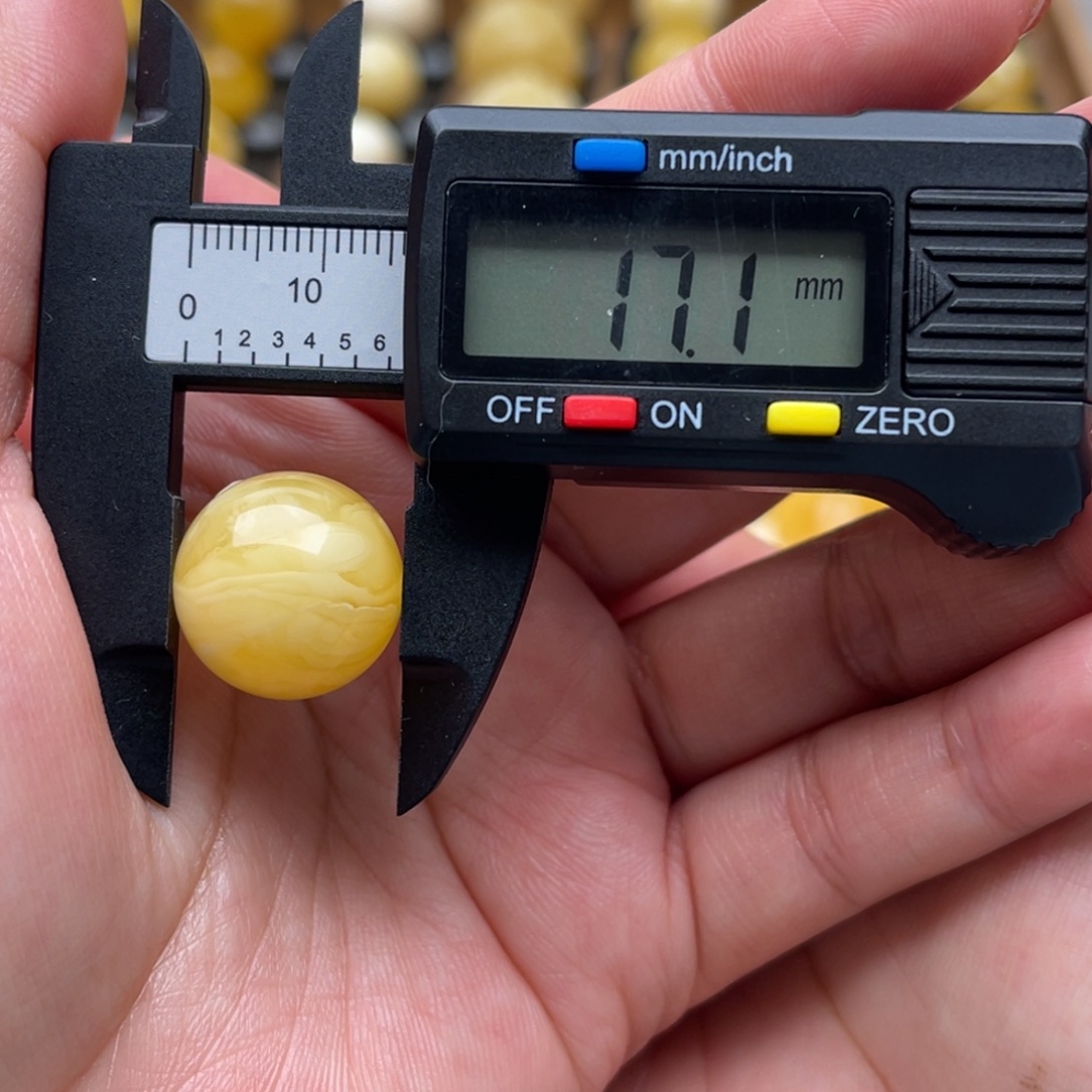 琥珀未镶嵌裸石蜜蜡圆珠笑