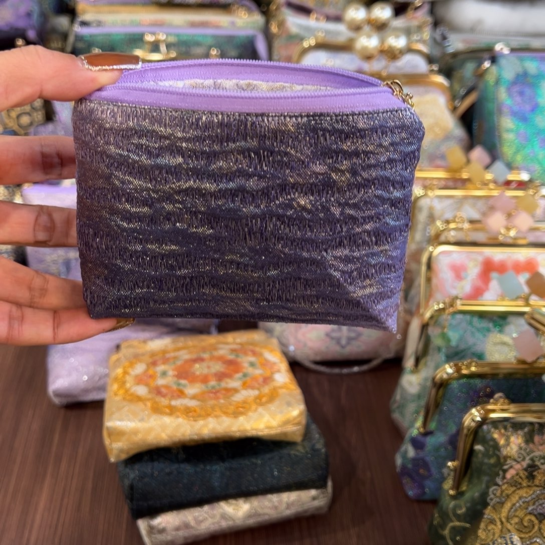 境***境蚕丝福利拉链零钱包