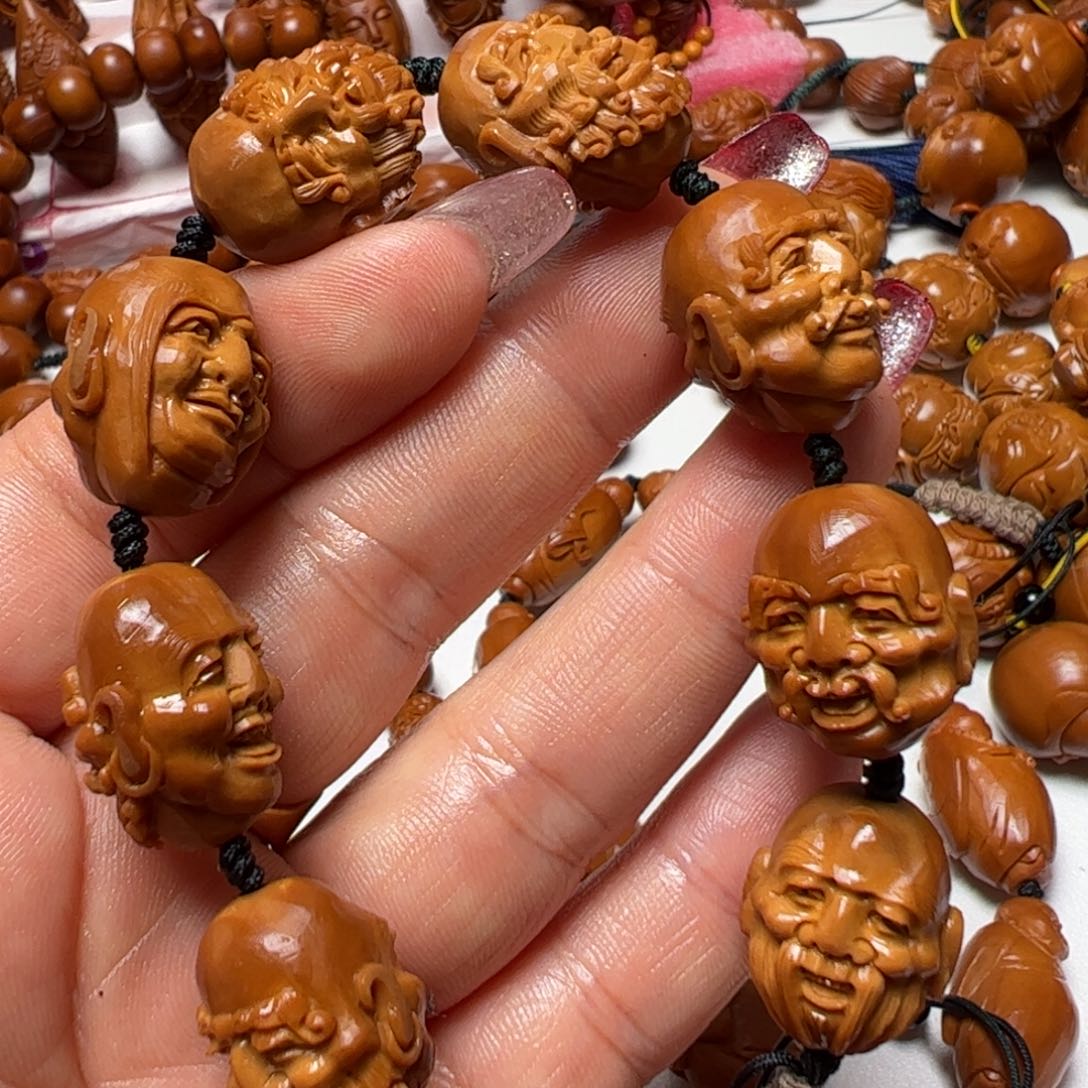 橄榄核手串?*。橄榄核雕