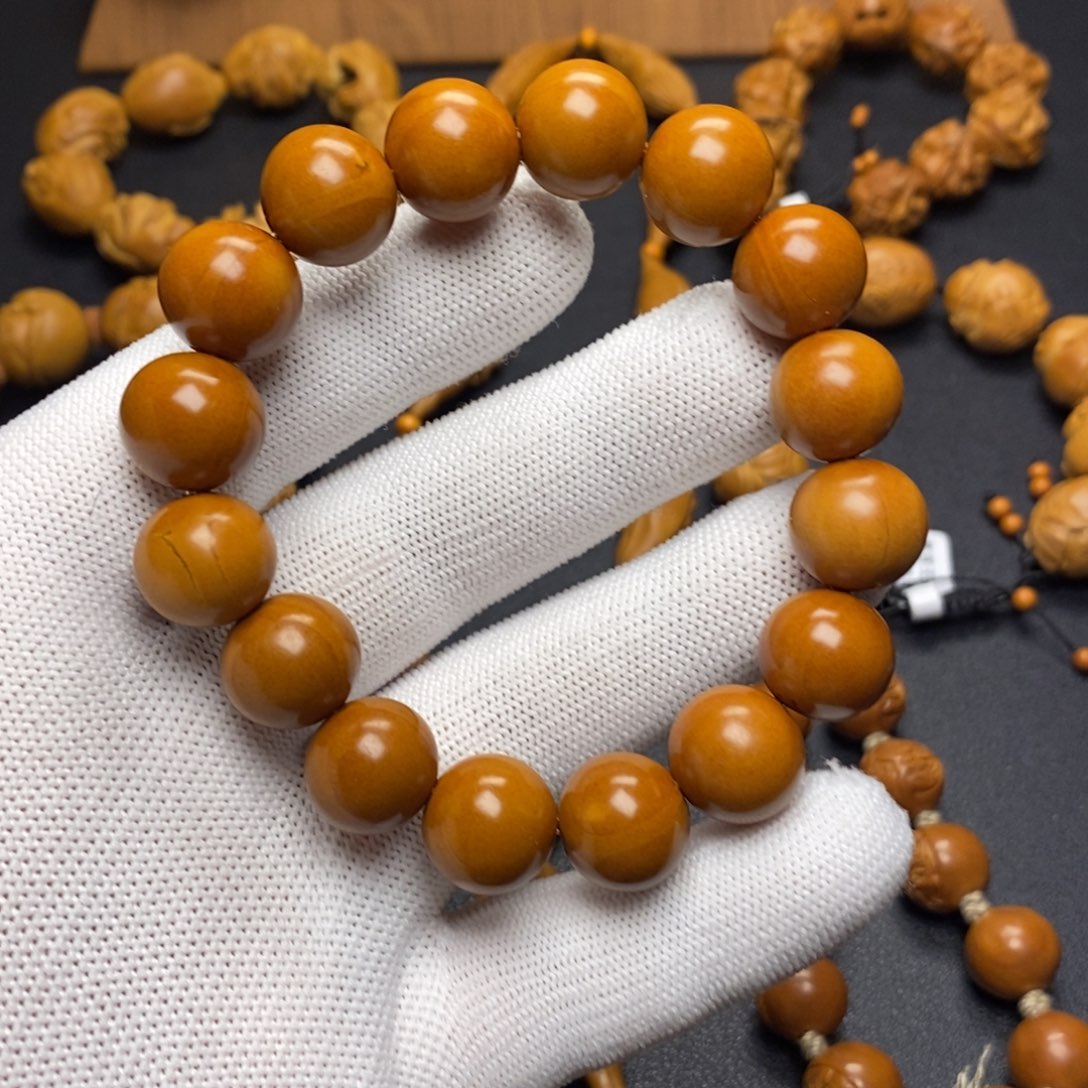 橄榄核手串/手链1.4正圆光珠（泛油）