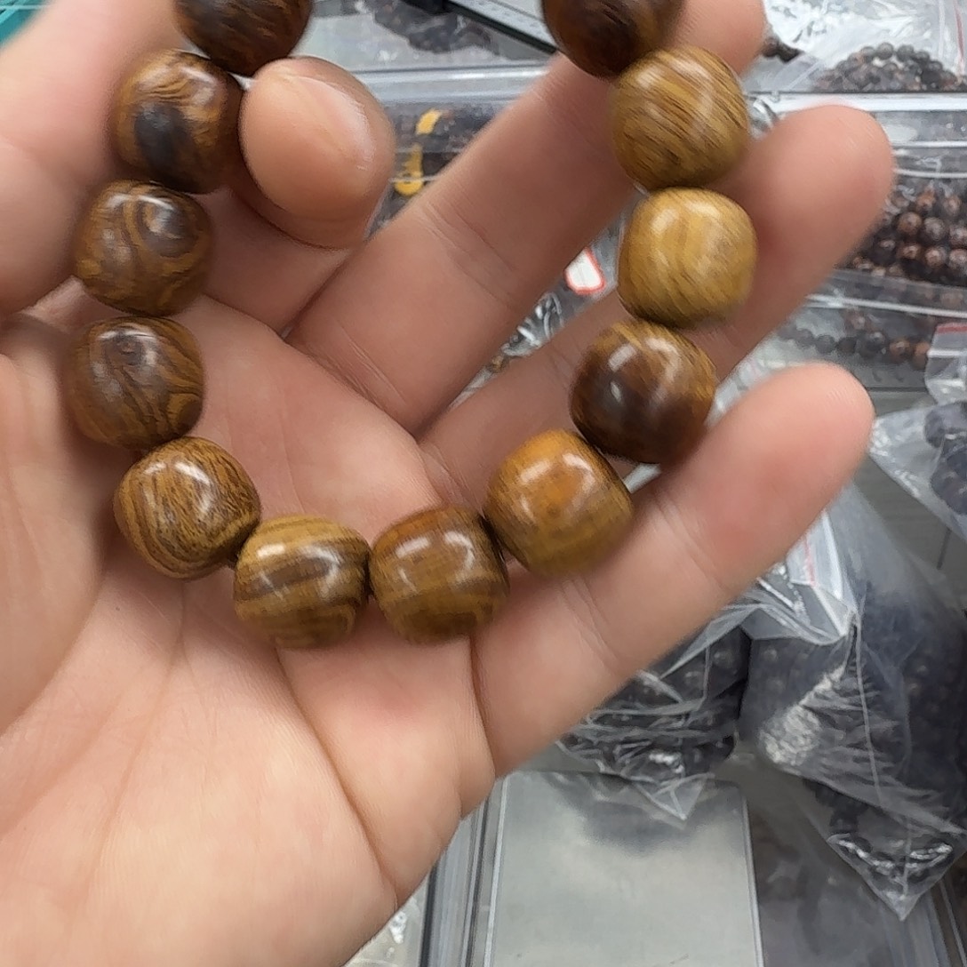 邀***影木海南黄花梨1.5直切手串