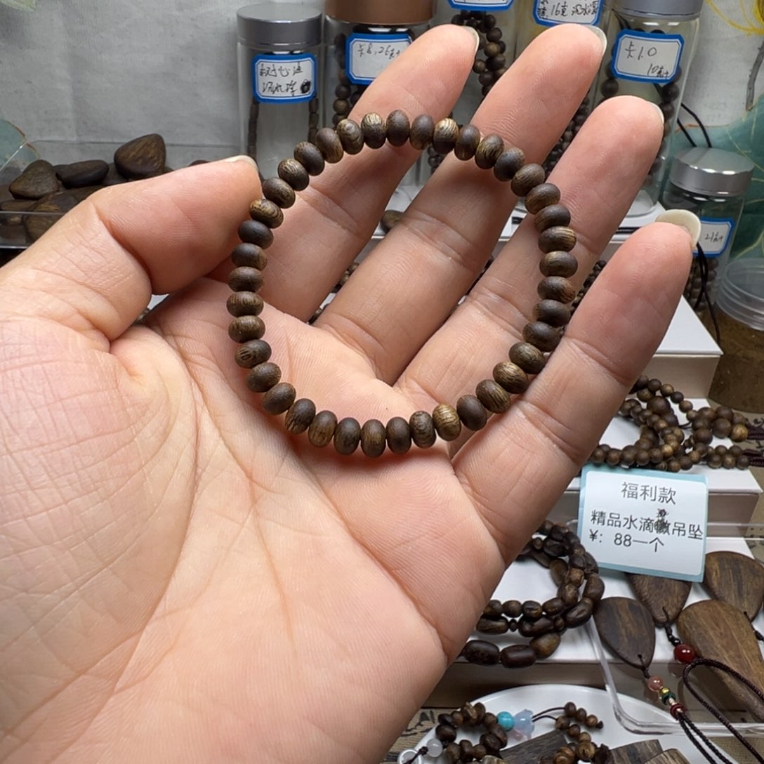 沉香碎屑沉香奇楠沉香卡6单圈算盘