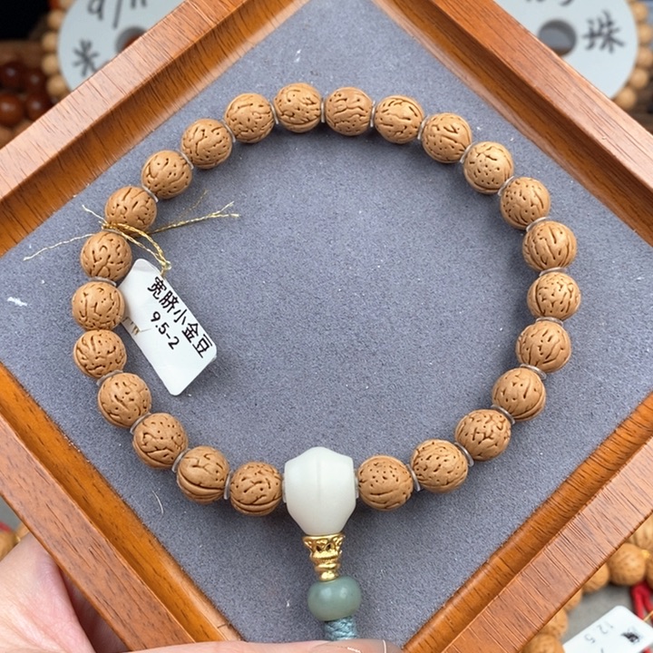 桃核手串宽脐小金豆9.5-2 头尾微修抛光尺寸误差0.5之间