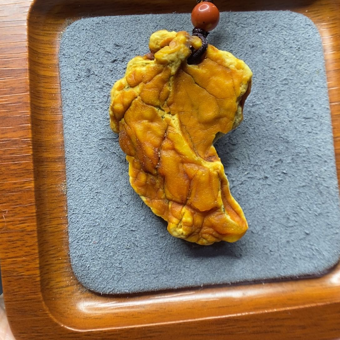 李***学蜜蜡未镶嵌颈饰郎