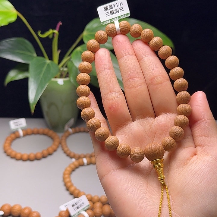 皓***店猴头核桃吊坠凤羽