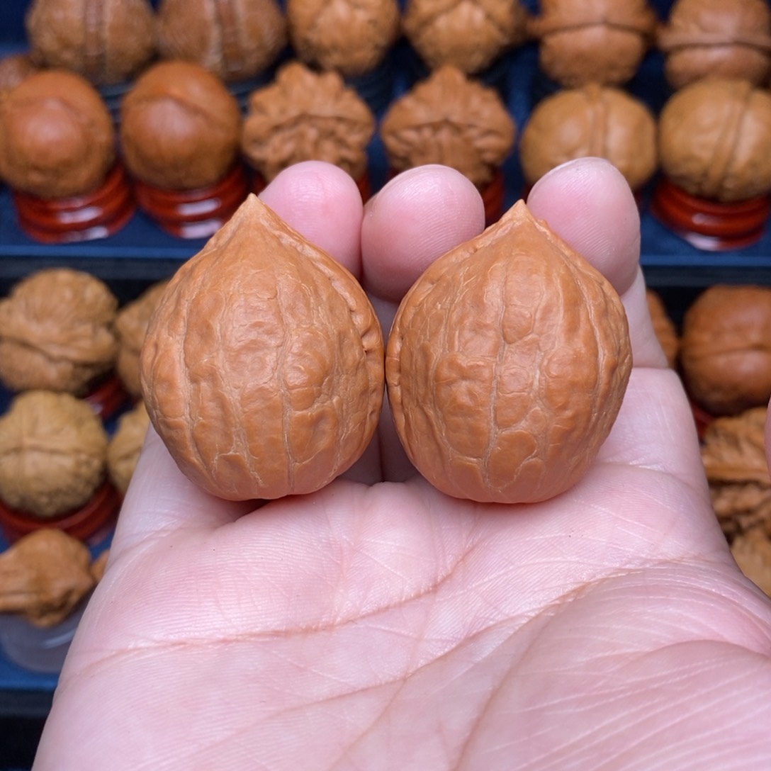 文玩核桃把件手捻塔尖佛肚