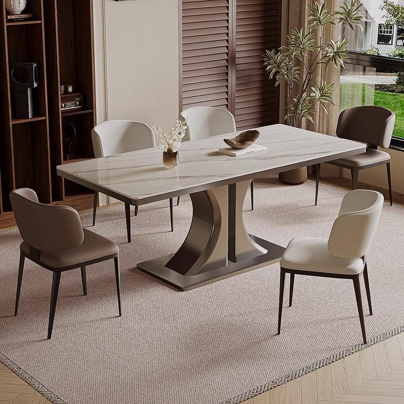 松弛感意式极简设计师款长方形餐桌家用不锈钢双C岩板餐桌椅现代