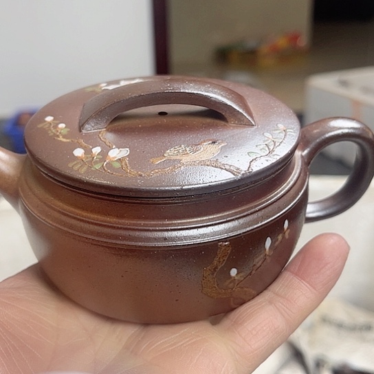 紫砂茶壶是的……是个