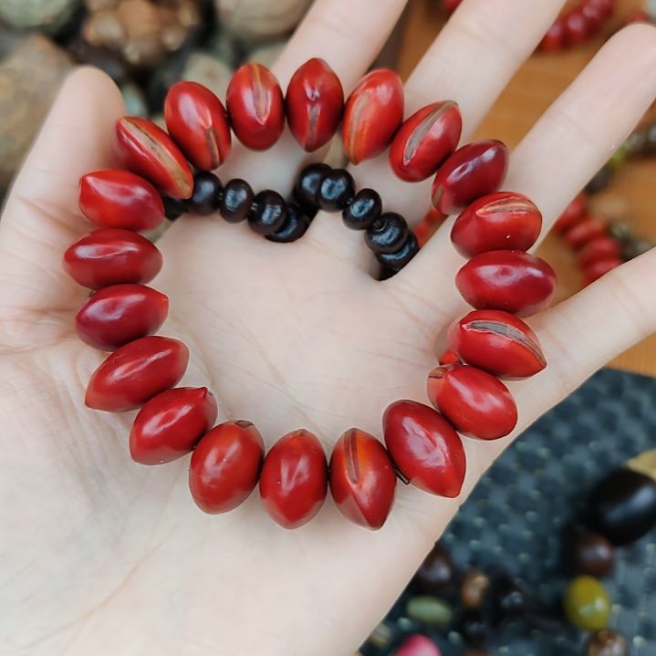 韦***棠红木鱼果菩提手串一款一物