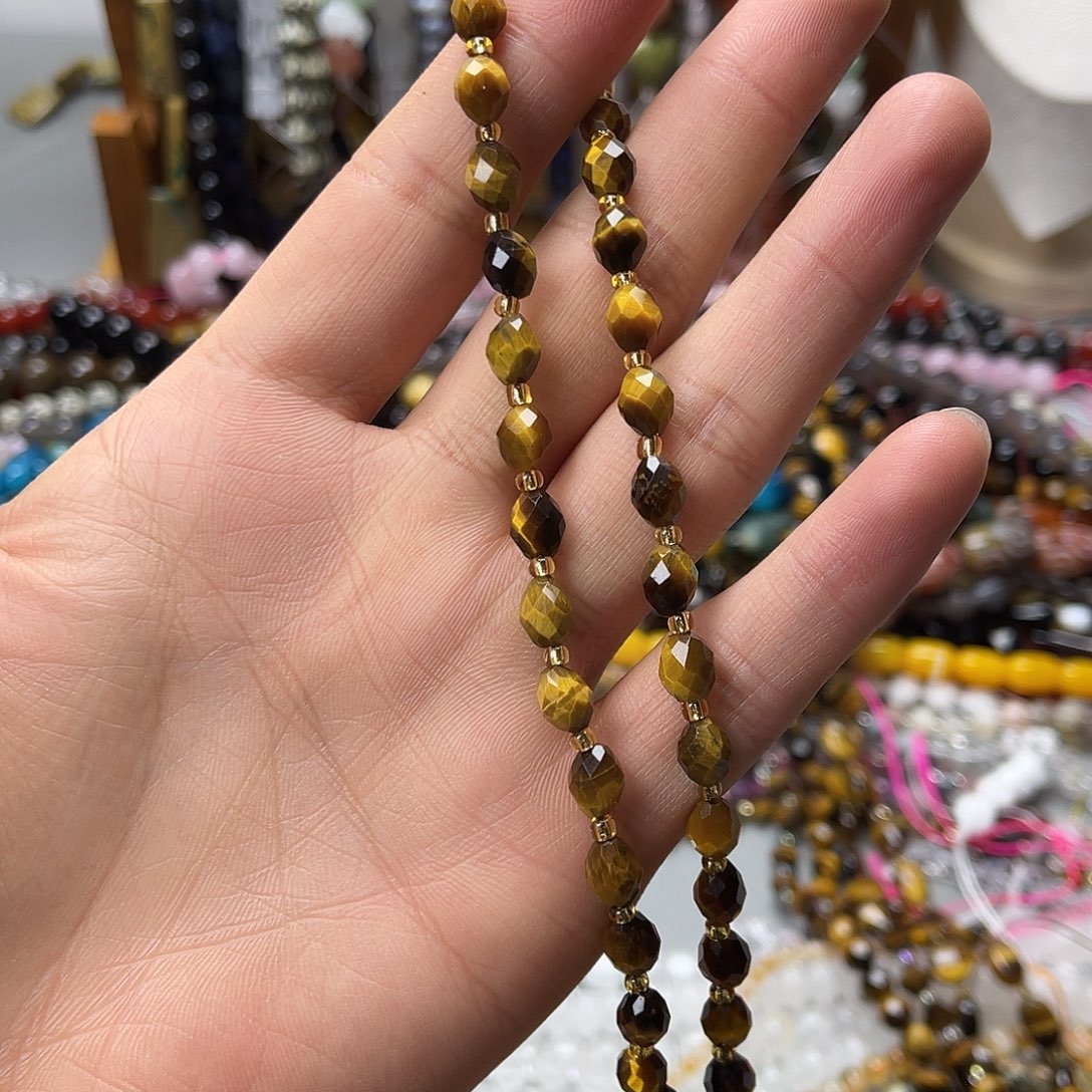 玛瑙/玉髓未镶嵌珠宝半成品6×8黄虎切面米珠一条