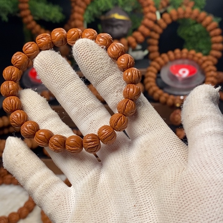 桃核吊坠谁**我秦岭龙纹