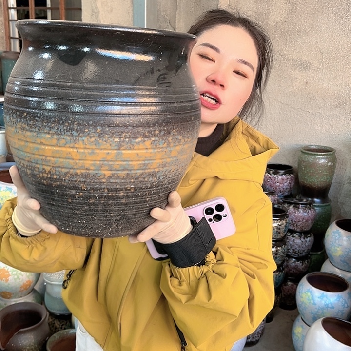 瑕疵口27高30花盆……