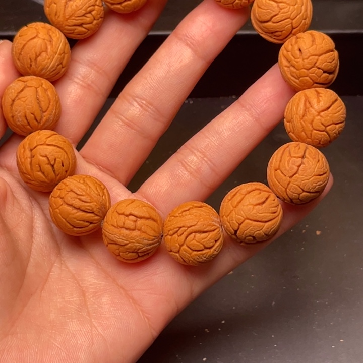 桃核手串金丝龙珠17