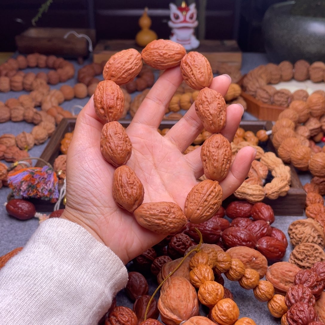 爱***心文玩核桃手串秋子