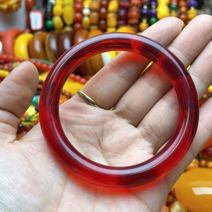 树脂制品慧**风42号红色手镯